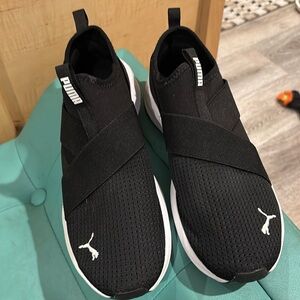 Black Puma slip on